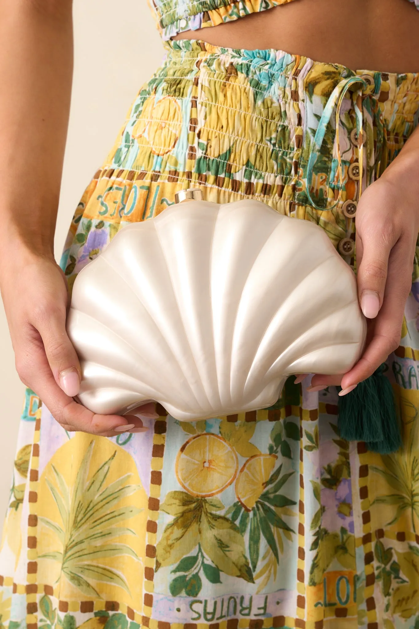 Making Tidal Waves Ivory Pearlescent Seashell Clutch